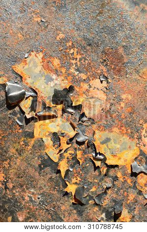 Old Painted And Rusty Metal Background. Close-up.