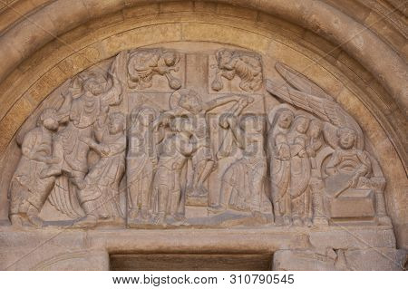 Basilica Of San Isidoro, Leon, Spain. Tympanum Decoration Of Door Of Forgiveness
