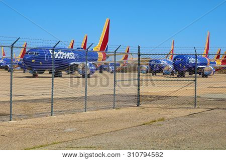June 18, 2019 In Victorville, Ca:  Rows Of Southwest Airlines Max-8 Aircraft Parked On The Tarmac Be