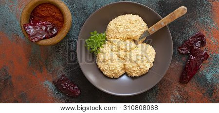 Serbian Salad Called Urnebes Of Cheese And Chili Peppers, Paprika Powder, Chopped Peppers And Dry Pe