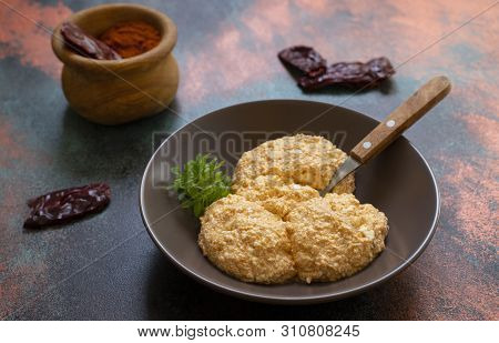 Serbian Salad Called Urnebes Of Cheese And Chili Peppers, Paprika Powder, Chopped Peppers And Dry Pe