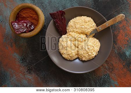 Serbian Salad Called Urnebes Of Cheese And Chili Peppers, Paprika Powder, Chopped Peppers And Dry Pe