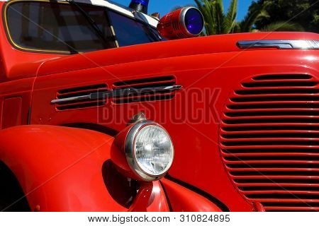 Old Red Shiny Vintage Firetruck With Siren