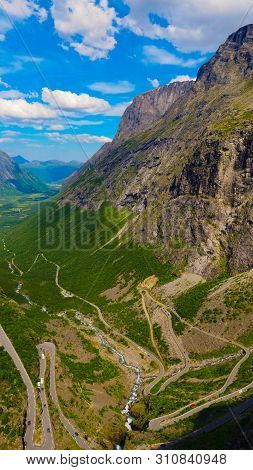 Trolls Path Trollstigen Winding Scenic Mountain Road With Many Cars, Norway Europe. National Tourist