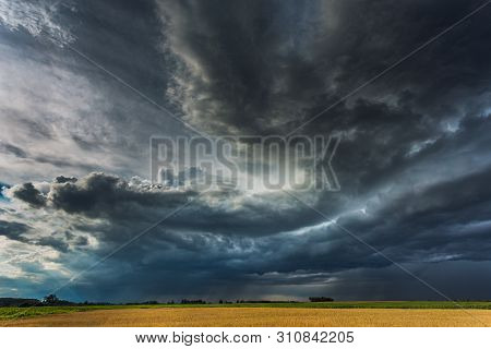 Storm Clouds With Shelf Cloud And Intense Rain