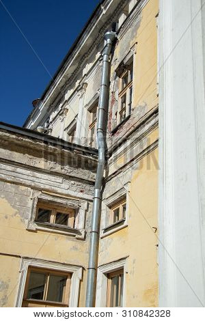 Windows And Drainpipes Of The Old Suburban House