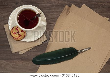 Working On The Letter On Wooden Table