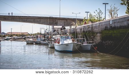 Mall Fishing Boats Docked In The Port Of Tavira, Portugal