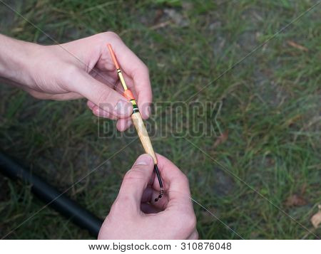 Man Clings To Fishing Line Close Up