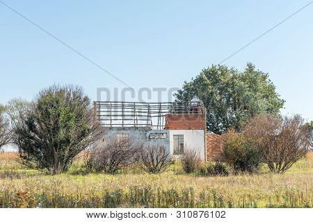 A Landscape, With A Ruin And Trees, Next To Road R38 Between Standerton And Bethal, In The Mpumalang