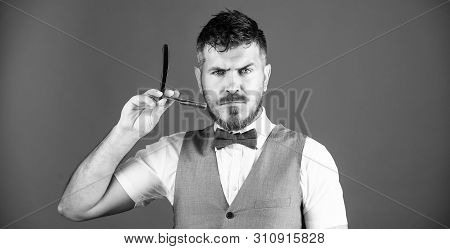 Sharp Razor. Bearded Man With Straight Razor In Barbershop. Brutal Man With Beard Holding Shave Razo