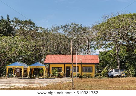 Puerto Princesa, Palawan, Philippines - March 3, 2019: Iwahig Penal Colony. Yellow Security Office W