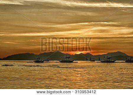 Tropical Landscape With Traditional Boats Of The Philippines. Elnido, The Island Of Palawan.