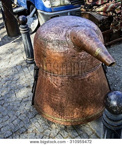 Old Copper Hooch Is Sold At The Flea Market In Georgia In Tbilisi