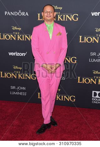 LOS ANGELES - JUL 09:  Eric Andre arrives for Disney's 'The Lion King' World Premiere on July 09, 2019 in Hollywood, CA