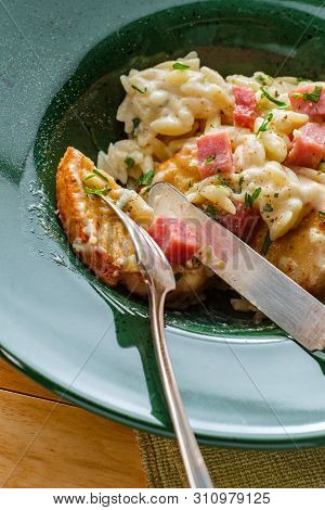 Chicken Cordon Bleu Served With Creamy Orzo Risotto And Ham