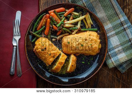 Russian Cuisine Stuffed Chicken Cutlets Kiev-style With Butter Sauce