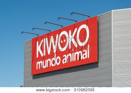 Santiago De Compotela, Spain; July 11 2019: Kiwoko Sign On Facade. Kiwoko Is A Spanish Pet Retailer