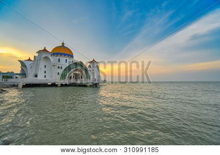 Kuala Lumpur, Malaysia - June 24, 2019: Beautiful Sunset Over The Malacca Straits Mosque Or Masjid S