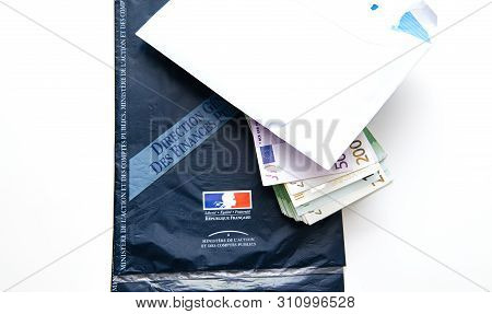 Paris, France - Mar 5 2019: Blue Envelope Of Declaration Des Revenus Income Statement Instruction Wi