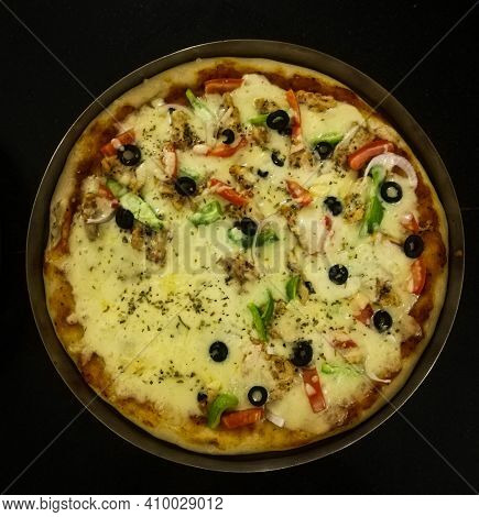 Tasty Italian Pizza Made From An Authentic Recipe. Mozzarella Topping Mealted On Top. Sauce Aside. P