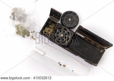 Joint Rolling Machine, Paper Rolling With Medical Marijuana Isolated On White