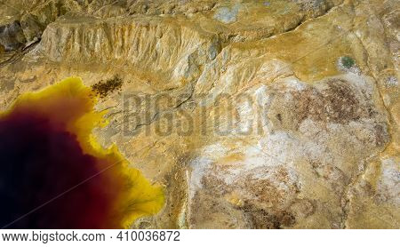 Aerial View Of Abandoned Opencast Copper Mine In Sia, Cyprus. Unusual Colors Derives From Massive Su