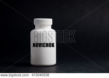 Poison Bottle Newbie On A Dark Background. Poison Newbie Chemical Weapons Concept.