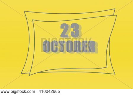 Calendar Date In A Frame On A Refreshing Yellow Background In Absolutely Gray Color. October 23 Is T