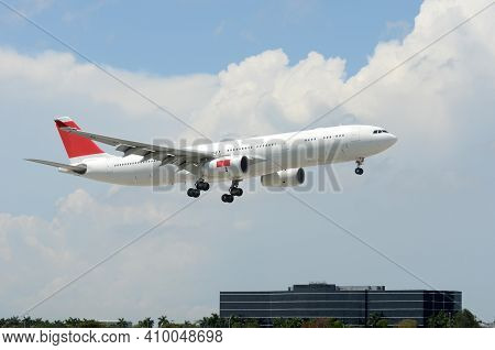 Widebody Heavy Passenger Jet Airplane Moments Before Landing
