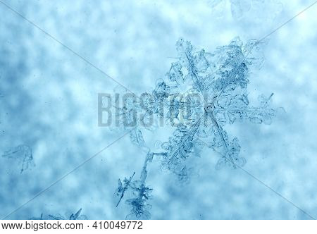 Macro Photo Of A Beautiful Snowflake Close-up