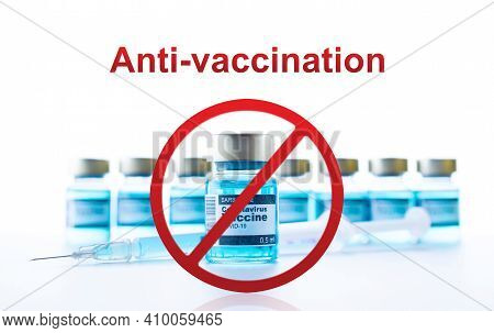 Anti Vaccination. Red Forbidden Sign With Medical Syringe, Needle For Protection Flu Virus And Coron