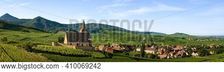 Summer Sunset View Of The Medieval Church Of Saint-jacques-le-major In Hunawihr, Small Village Betwe