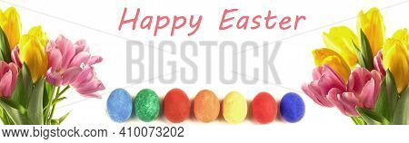 Easter Eggs. Happy Easter Card. Multi-colored Easter Eggs. Easter. Easter Eggs On A White Wooden Bac