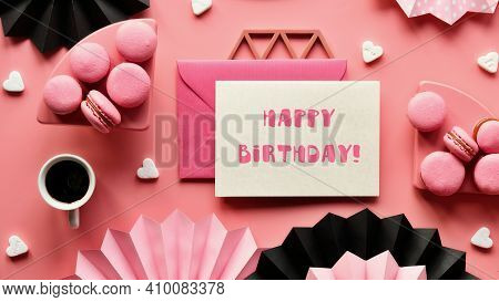 Happy Birthday Sweet And Tasty Macaroons And Coffee. Creative Monochrome Flat Lay On Pink Color Pape