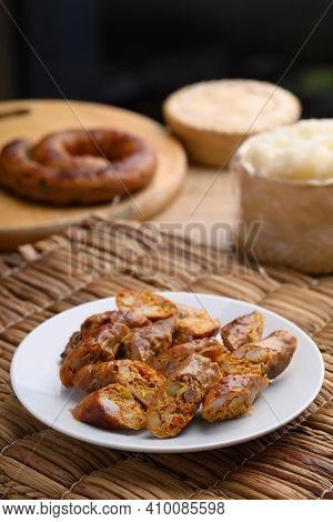 Northern Thai Sausage (sai Aua), Grilled Intestine Stuffed With Minced Pork, Spices And Herbs Eating