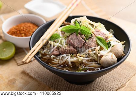 Rice Noodle Soup With Pork, Pork Ball And Vegetables In A Bowl, Thai Noodles Soup