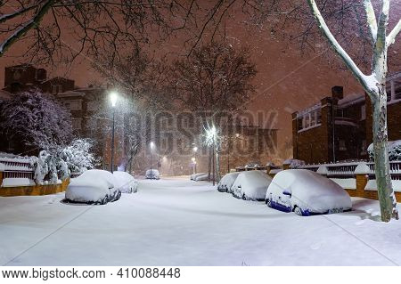 Cars And Streets Covered In Snow In Night Image Of Filomena Storm Fall In Madrid Spain. Europe