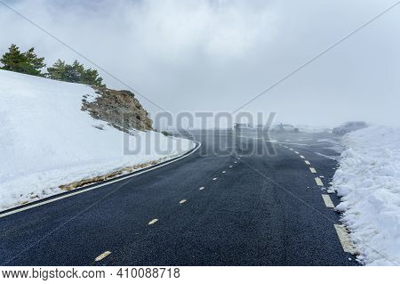 High Mountain Road With Clouds And Thick Fog. Morcuera Madrid.
