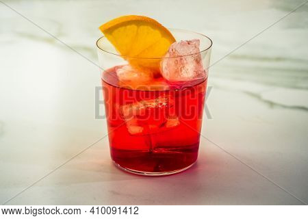 Campari Soda Aperitivo Cocktail Pre Dinner Drink Garnished With An Orange Slice In A Tumbler On The 