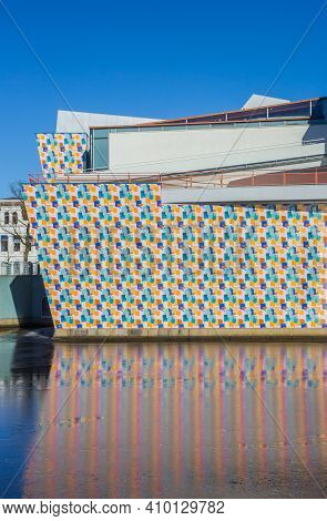 Groningen, Netherlands - February 13, 2021: Colorful Pattern Reflected In The Frozen Water  Of The C