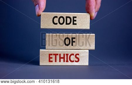 Code Of Ethics Symbol. Concept Words 'code Of Ethics' On Wooden Blocks On A Beautiful Grey Backgroun