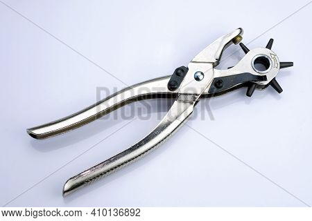 Metal Hole Punch For Punching Holes In Leather Goods. Device For Punching Holes In The Sewing Indust