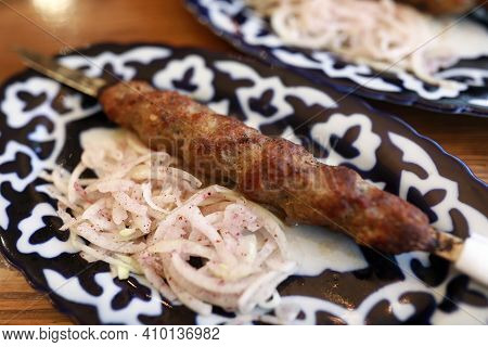 Lula Kebab On Skewer With Onions