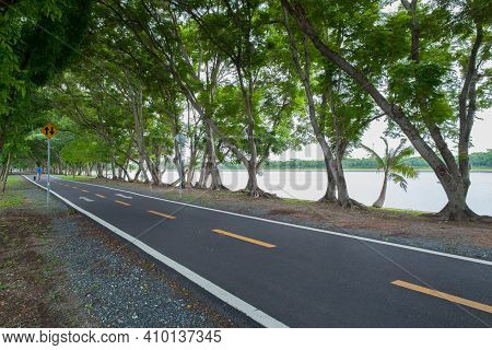 Empthy Running Lanes Of Road In Park