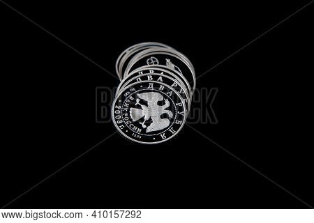 Silver Coins Of The Bank Of Russia On A Black Isolated Background.