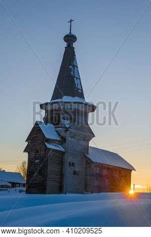 The Old Wooden Church Of Elijah The Prophet Is Close-up Against The Background Of The Setting Sun In