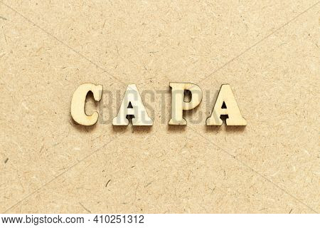 Alphabet Letter In Word Capa (abbreviation Of Corrective Action And Preventive Action) On Wood Backg