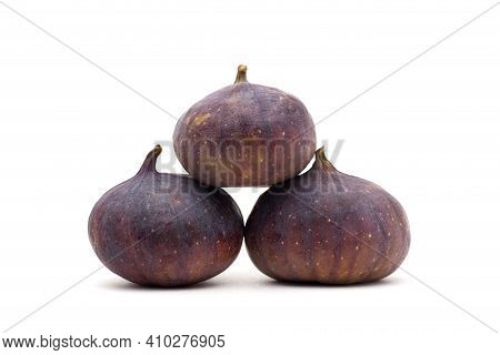 Three Purpel Brazil Figs Isolated On White