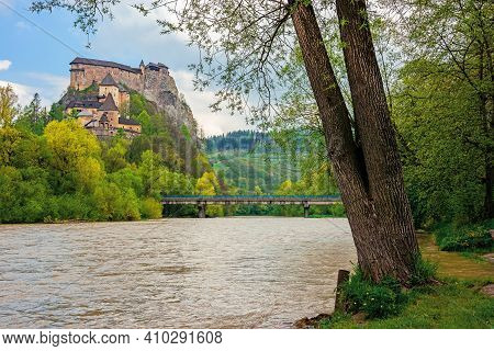 Oravsky Podzamok, Slovakia - May 01, 2019: Oravsky Castle On The Hill Near The River. Popular Travel